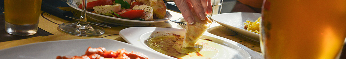 Eating Mediterranean at Limani restaurant in New York, NY.